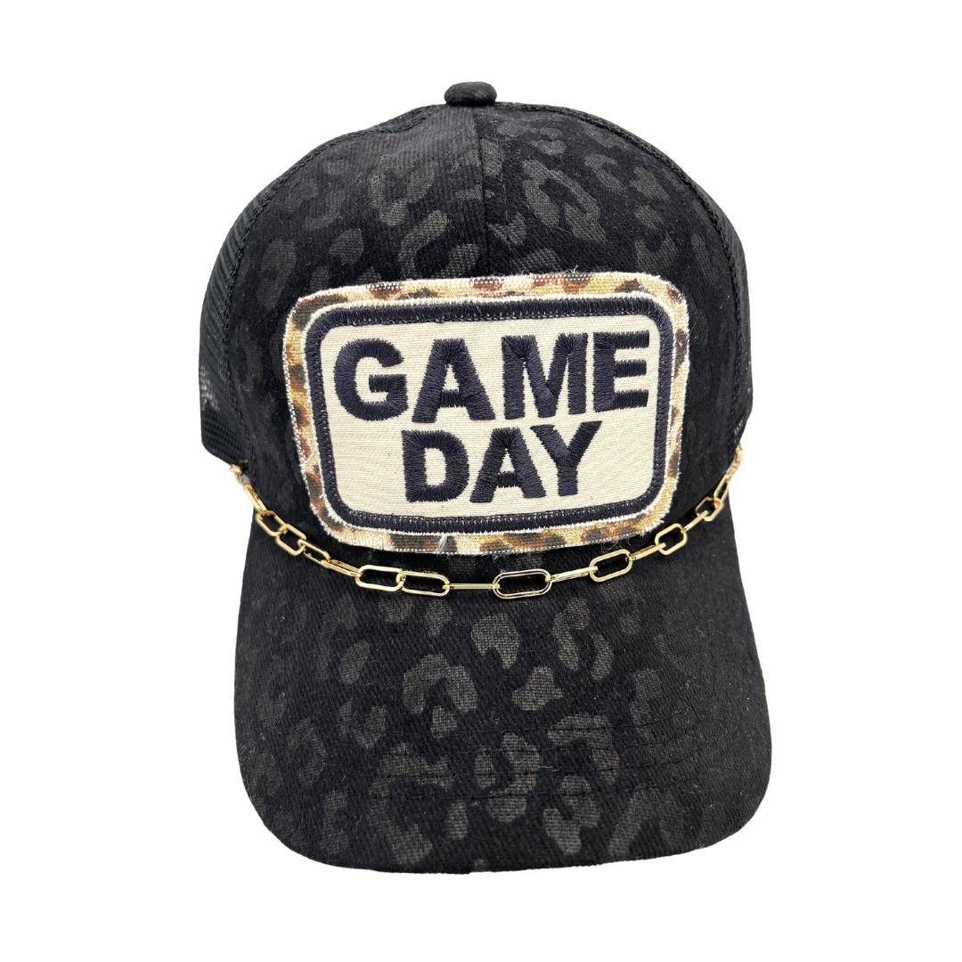 Game day black leopard criss cross trucker 