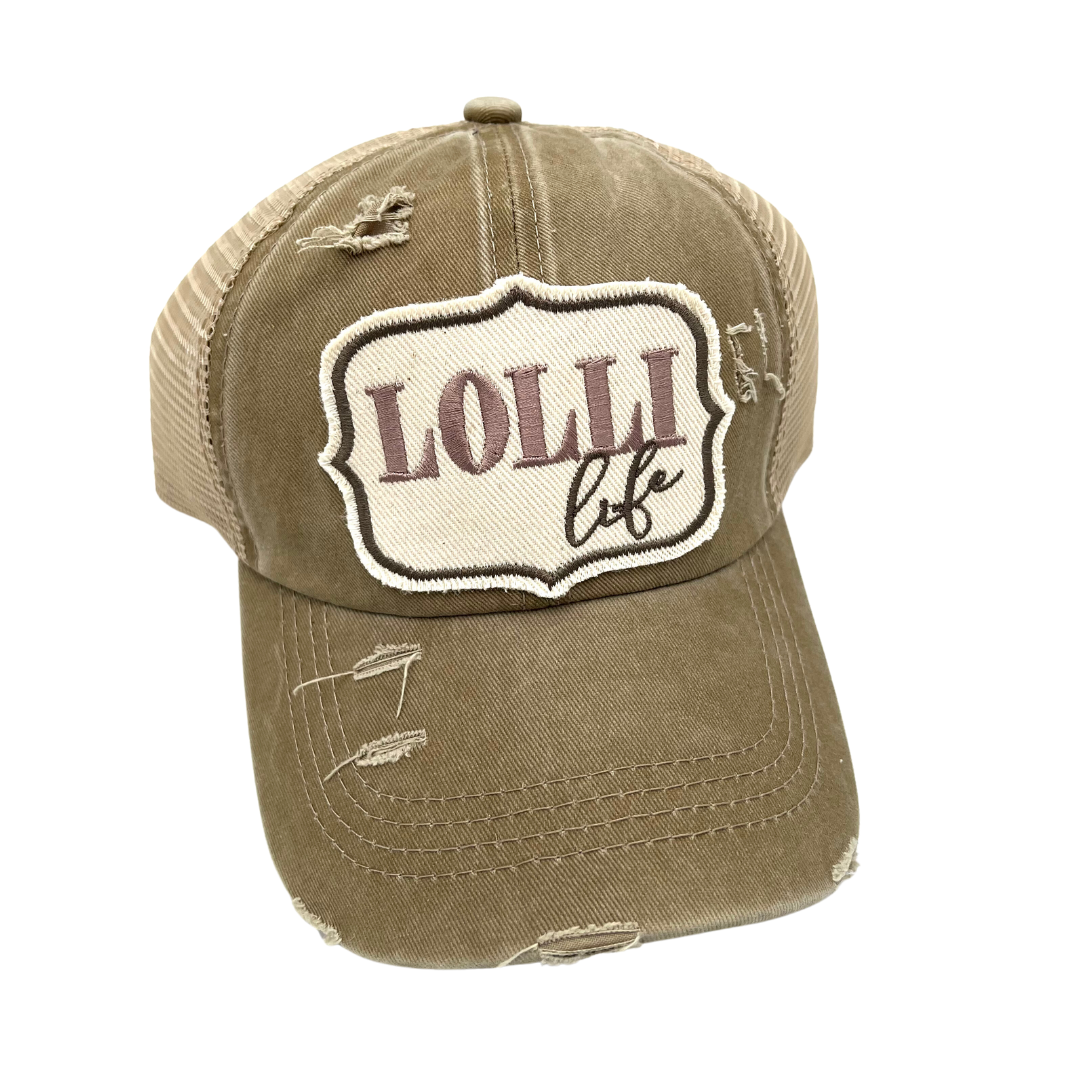 LOLLI LIFE CRISS CROSS PONYTAIL TRUCKER