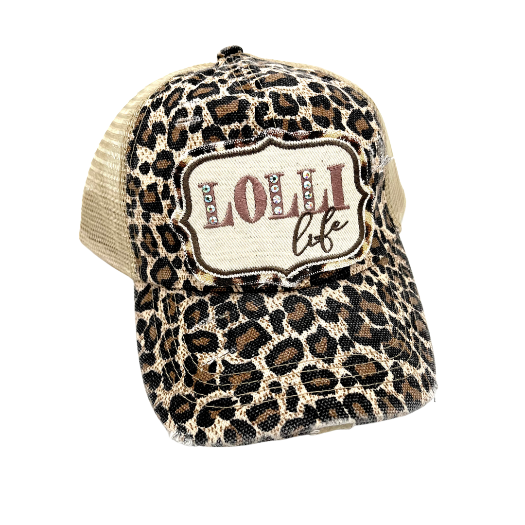 LOLLI LIFE CRISS CROSS PONYTAIL TRUCKER