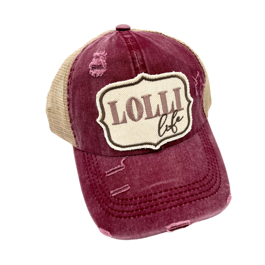 LOLLI LIFE CRISS CROSS PONYTAIL TRUCKER