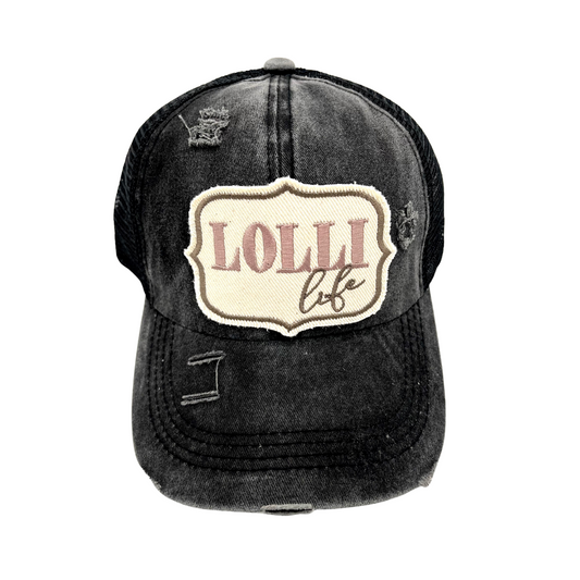 LOLLI LIFE CRISS CROSS PONYTAIL HAT