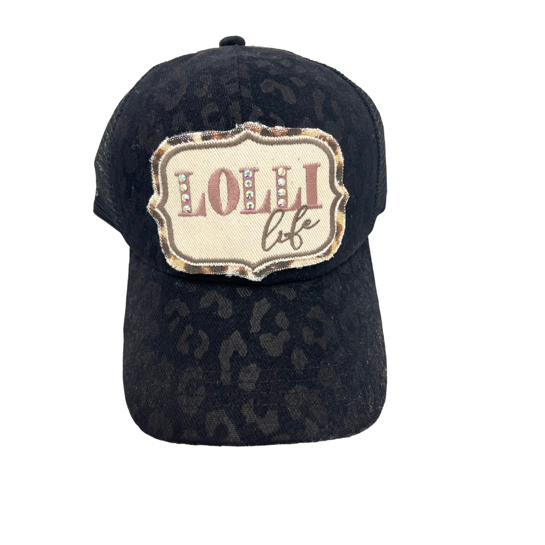 LOLLI LIFE CRISS CROSS PONYTAIL TRUCKER